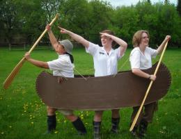 3 people in a canoe